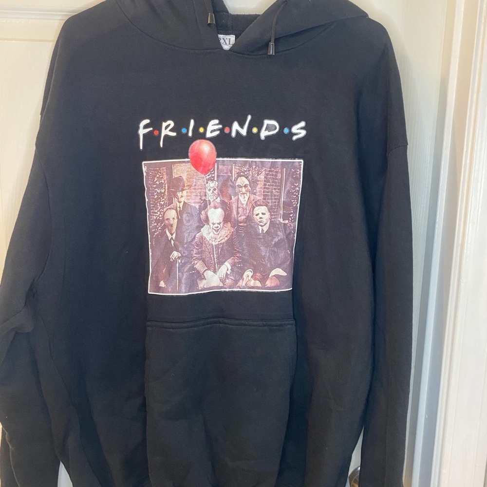 Black Hoodie with Graphic Design and Nostalgic Appeal